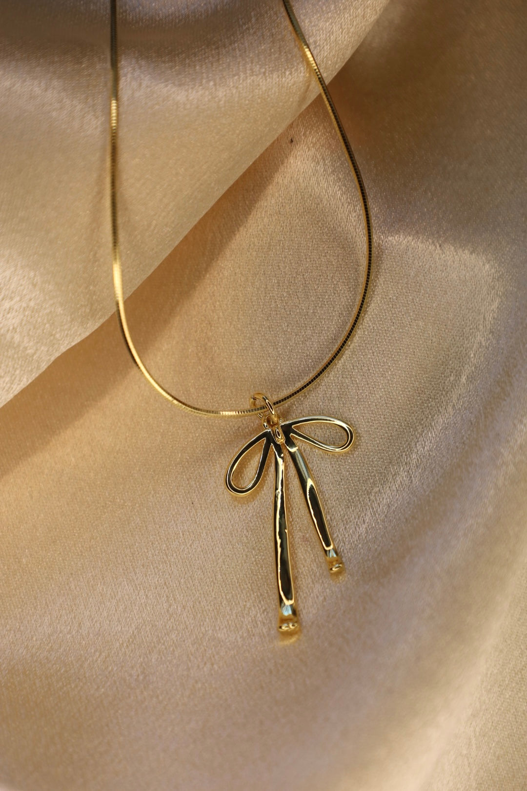 Lana bow necklace