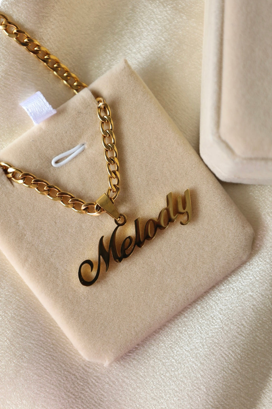 His custom name necklace