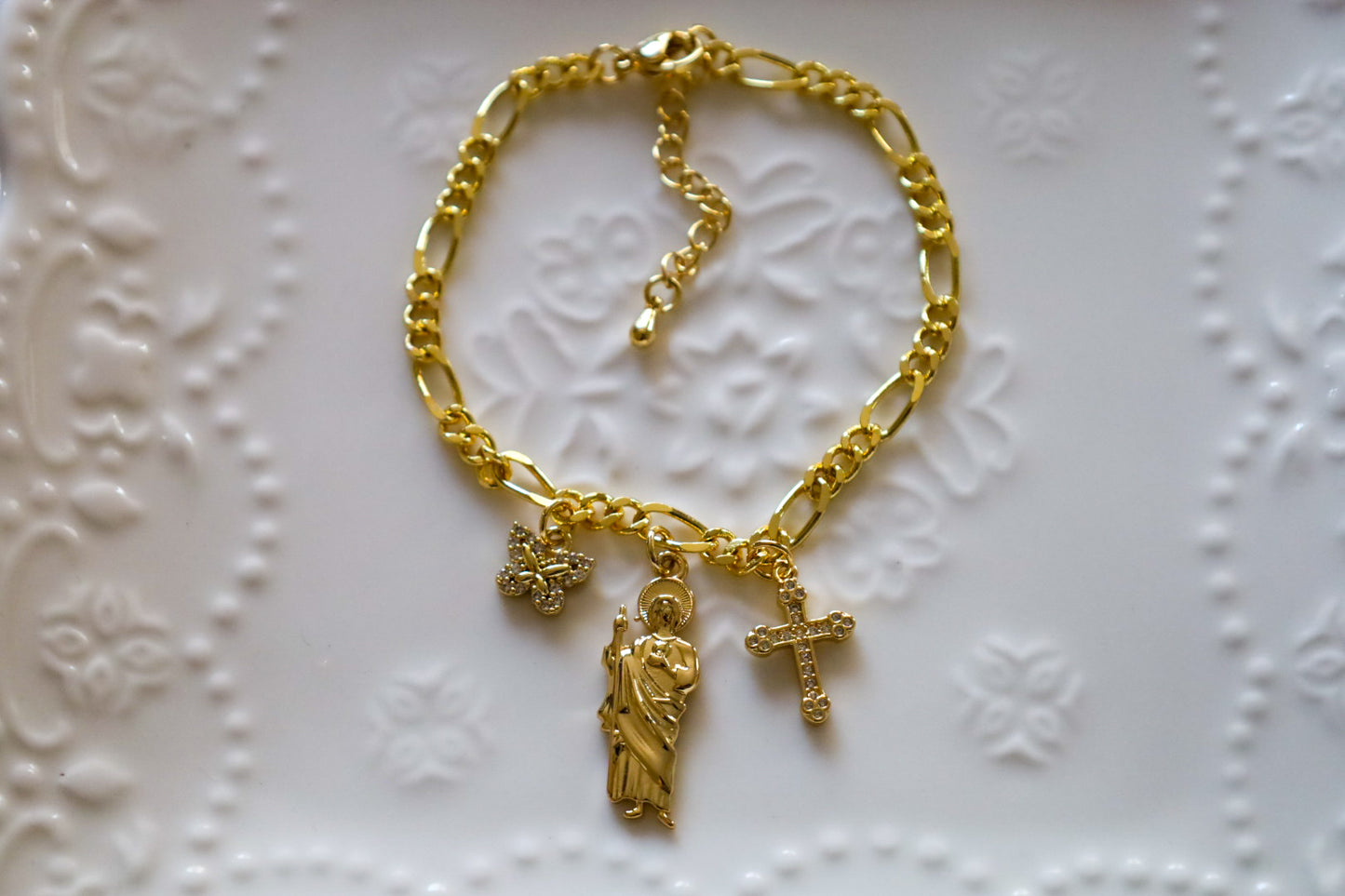 San Judas butterfly x cross bracelet