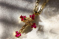 Fuchsia cross necklace