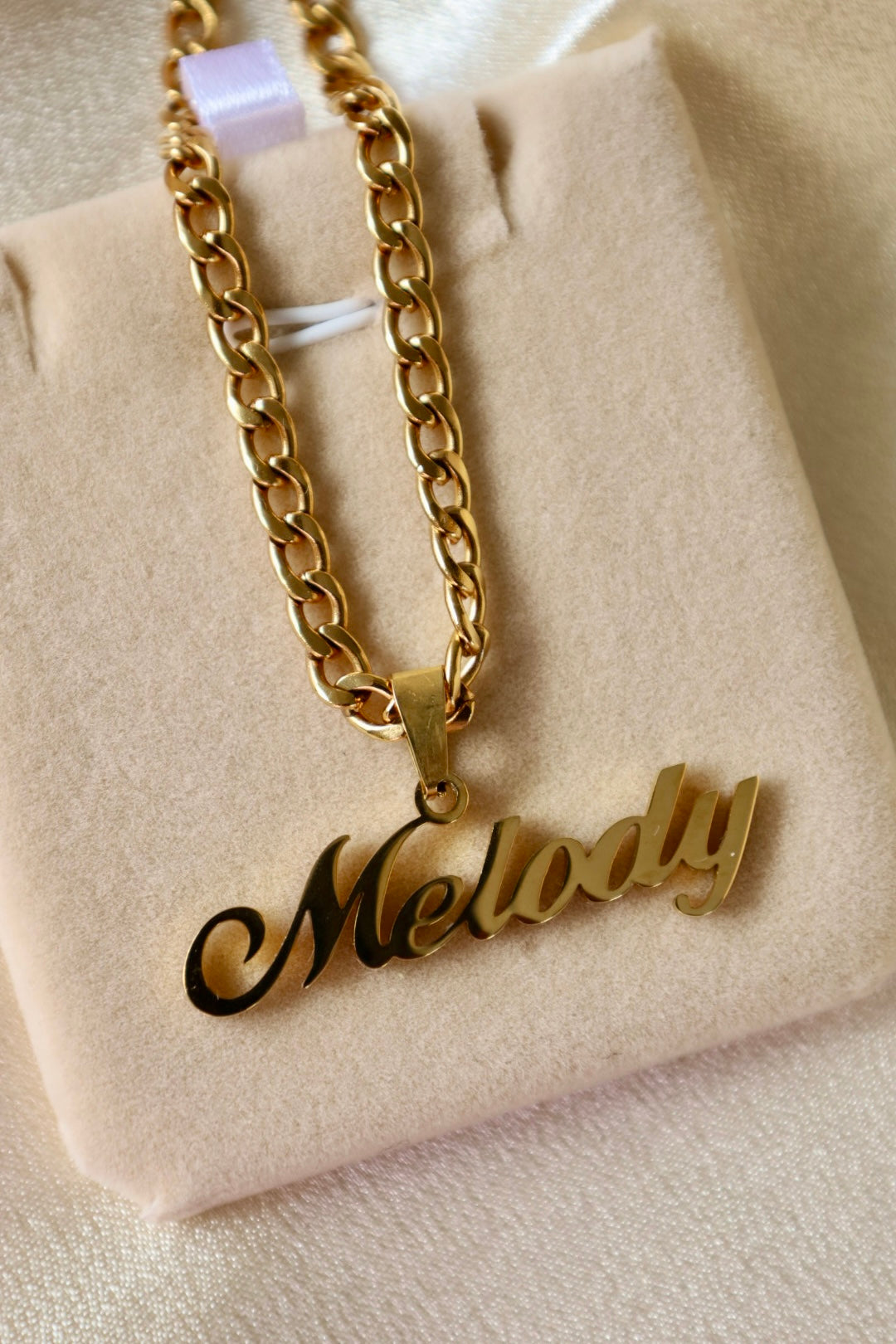 His custom name necklace