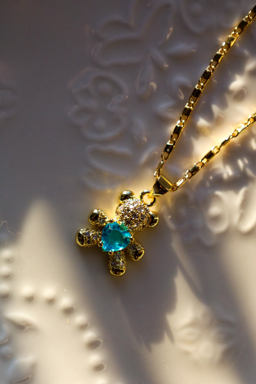 Blue teddy necklace
