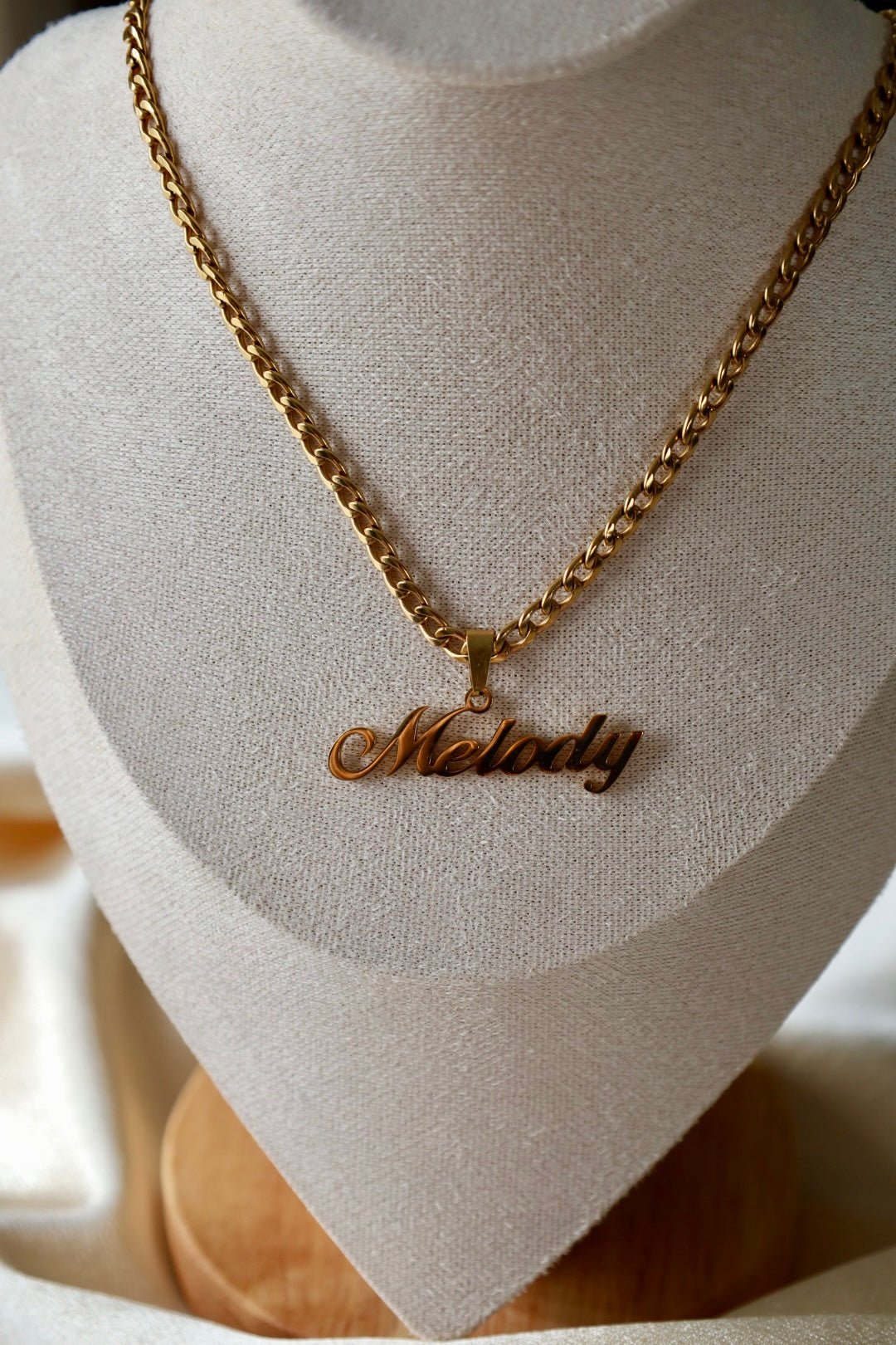His custom name necklace
